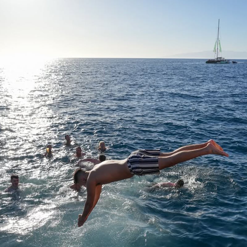 Man jumping into the water on the Tenerife Boat Party