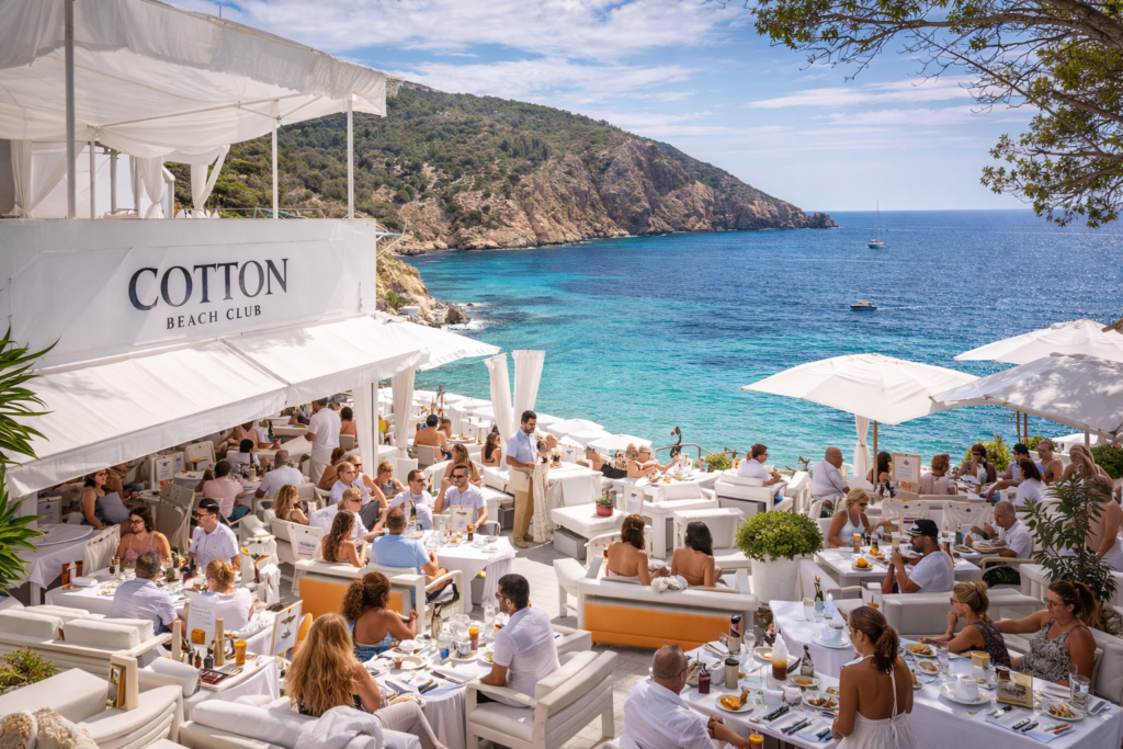 Best Beach Clubs in Ibiza (2026 Guide) 3 People relaxing outside Cotton Beach Club (Playa d'en Bossa)