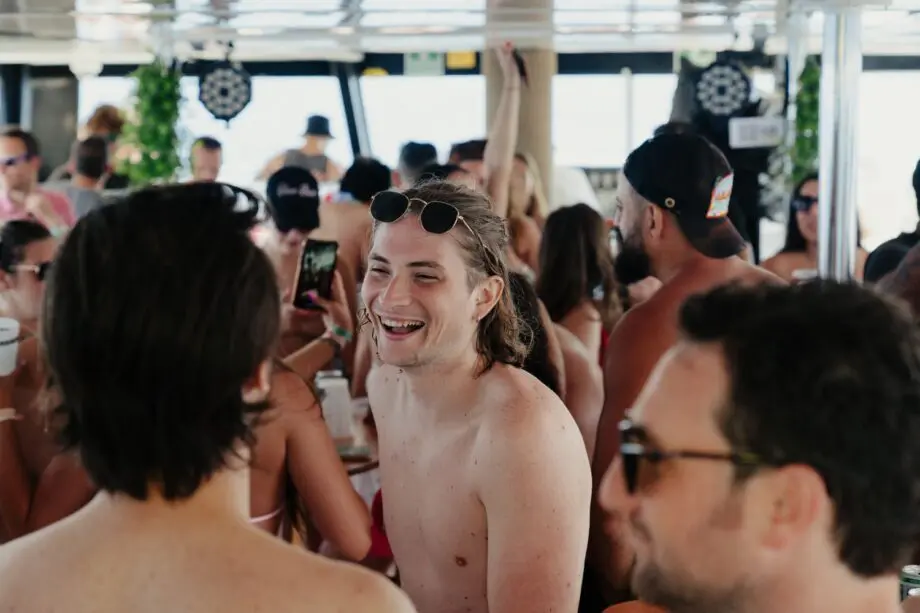 Friends chatting on the Barcelona boat party