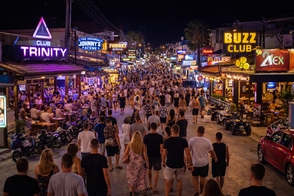 Kavos Resort Guide 2026: The Ultimate Party Holiday Destination 1 Kavos Strip with lots of people and bars