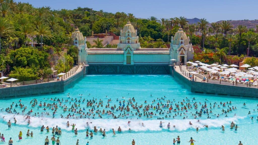 Lots of people in the wave pool at Siam Park Waterpark, Tenerife
